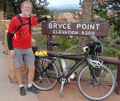 Day 3 - Paul at Bryce Canyon 8300 ft elevation sign - R.jpg